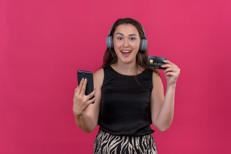 Woman happy with her Aeroplan Credit Card.