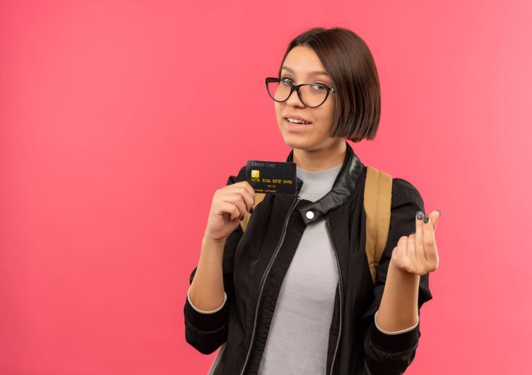 Woman holding her Citi Diamond Preferred.