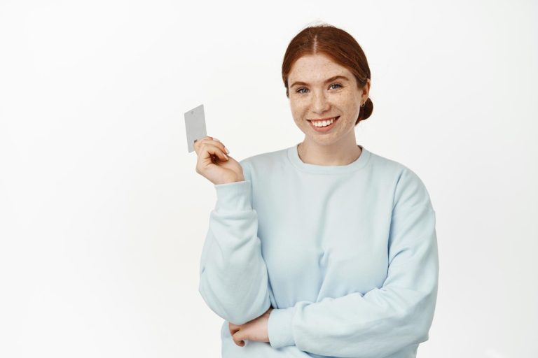 Woman holding her Discover it Secured.