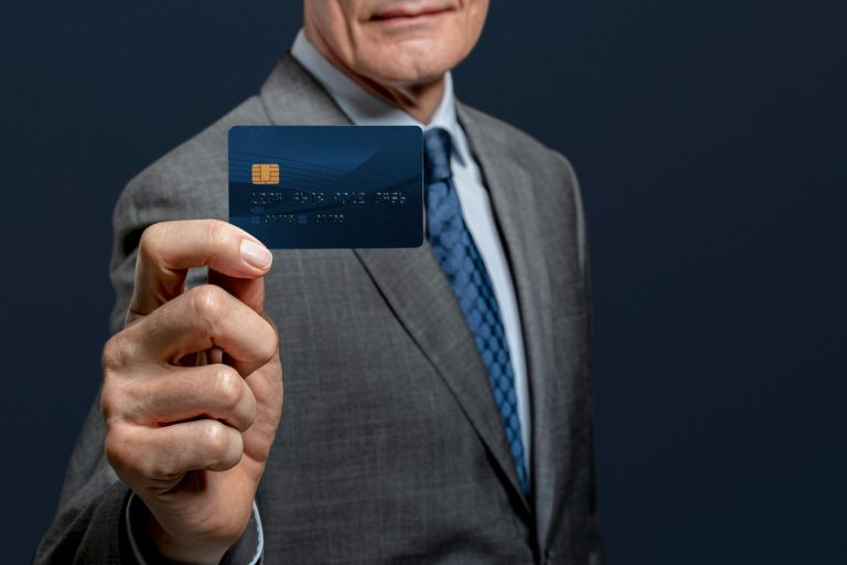 A man holding his INK Business Preferred.